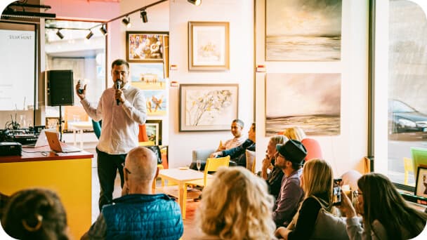 Community event people listening a talk feature